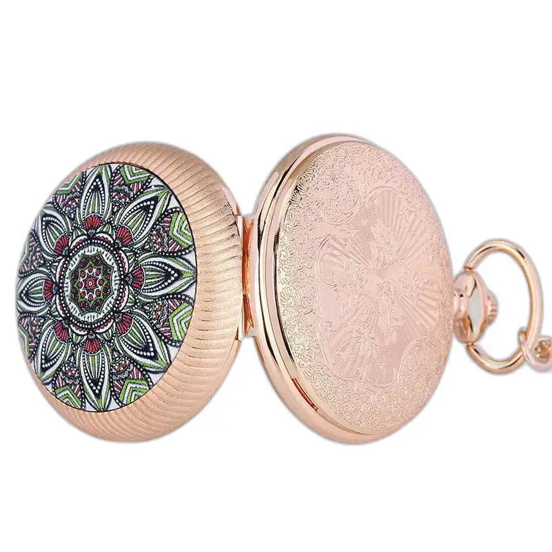 Quartz Luxe åpen lommeur i rosa gull med smaragdsteiner på platespiller